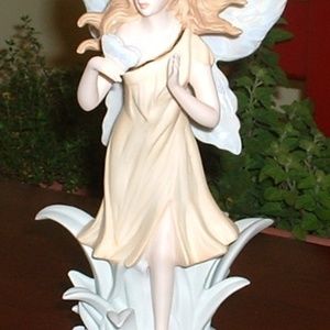 Bisque Fairy  with Lustrous Wings   7 Inches Tall